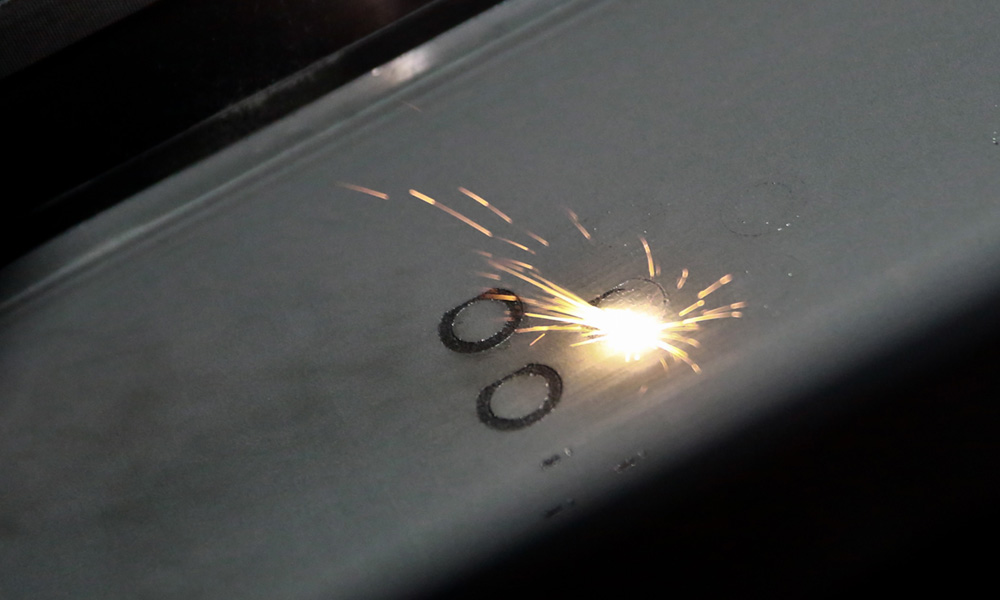 Laser beam forming shapes in metal 3D printer