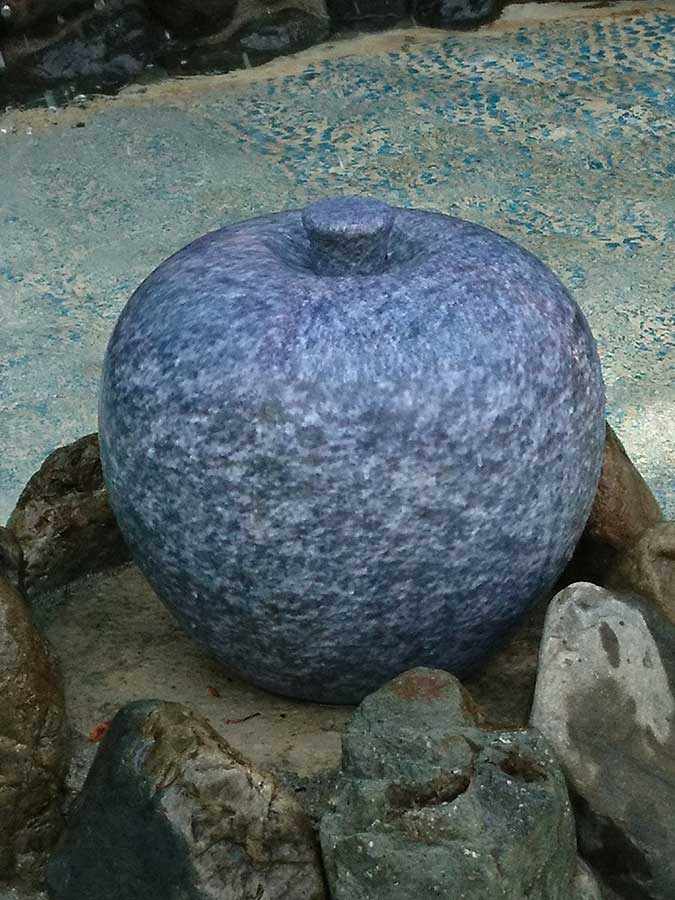 A 3D-printed blue stone-like apple