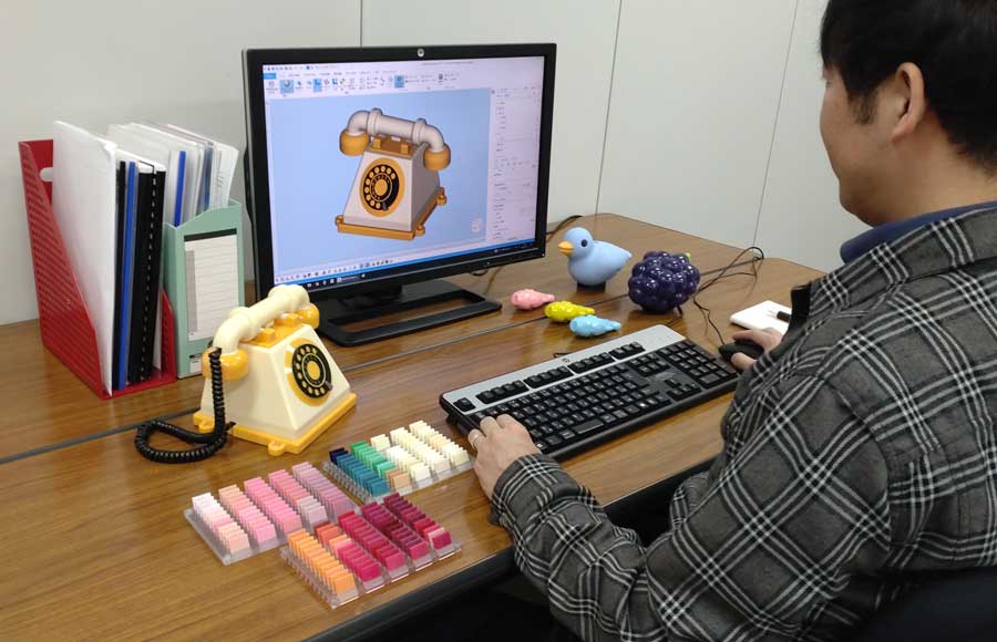 A designer using Magics to adjust the various colors in a CAD design