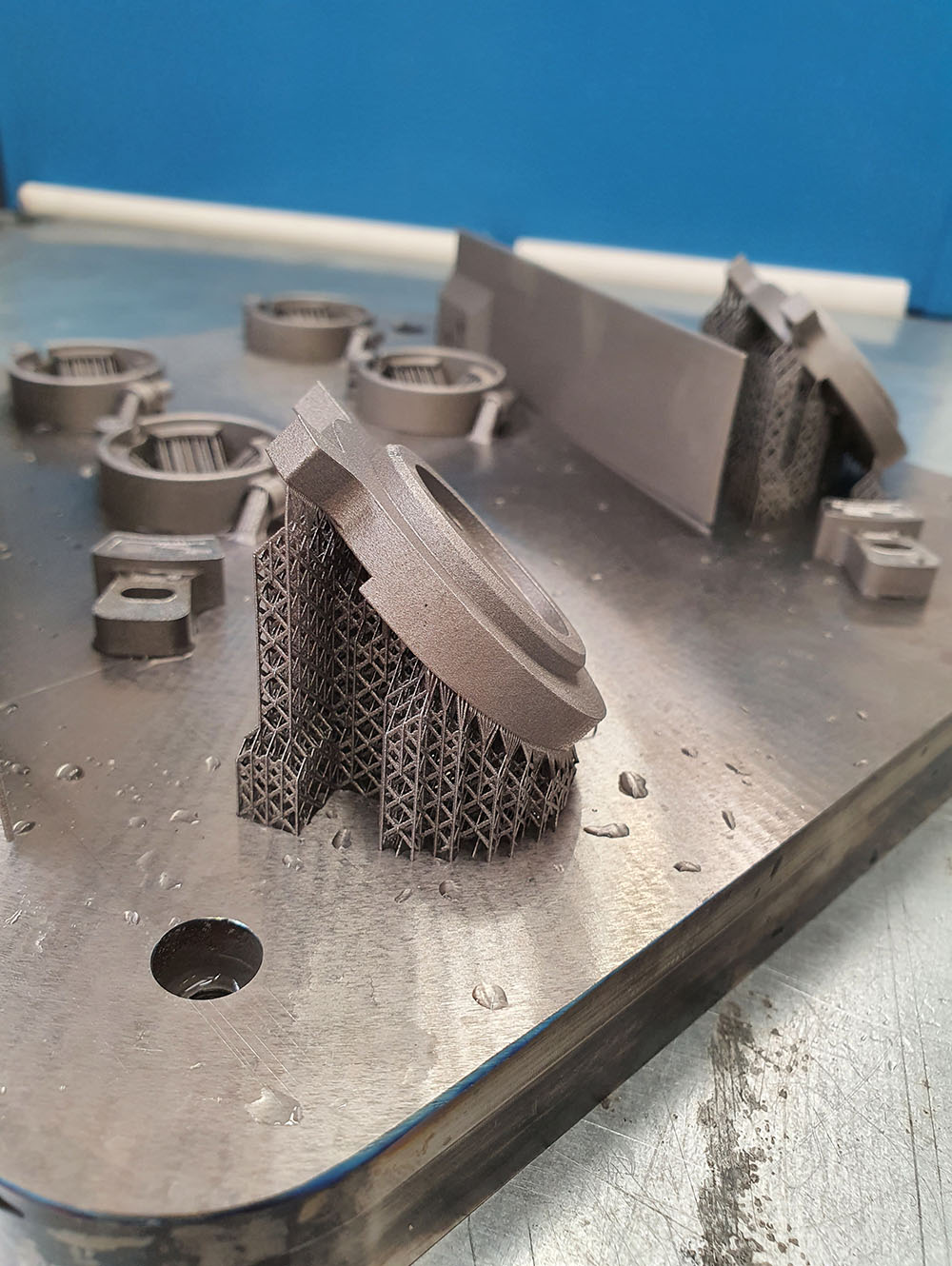 Metal 3D-printed parts with automated support generation by Materialise e-Stage