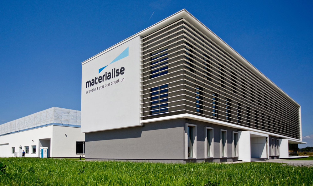 Exterior view of the Materialise Poland building, with a beautiful blue sky, located in Wrocław
