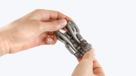 Hands with 3D printed piece