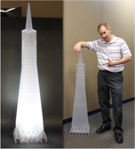 Todd Reese pictured with the scale model of the Transamerica Pyramid